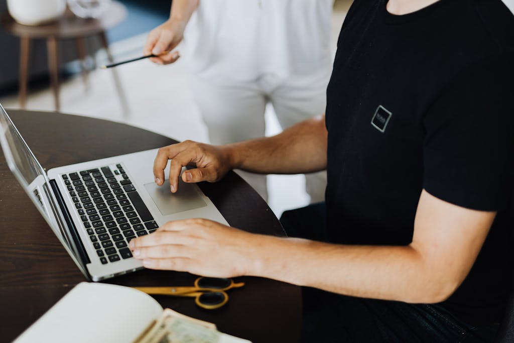 People in Office Working on Laptop 